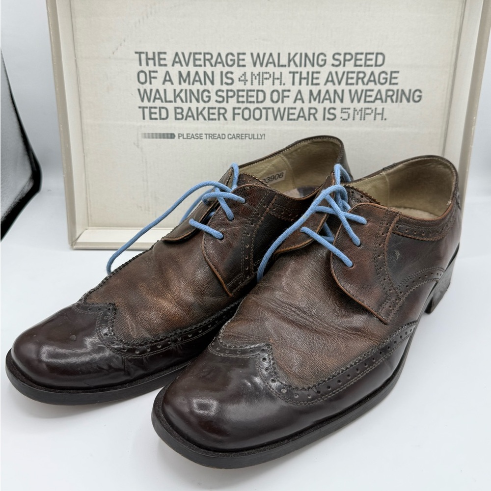 Ted Baker London Cuba Dress Shoes
Size: 9
Color: Brown
Made in in Italy